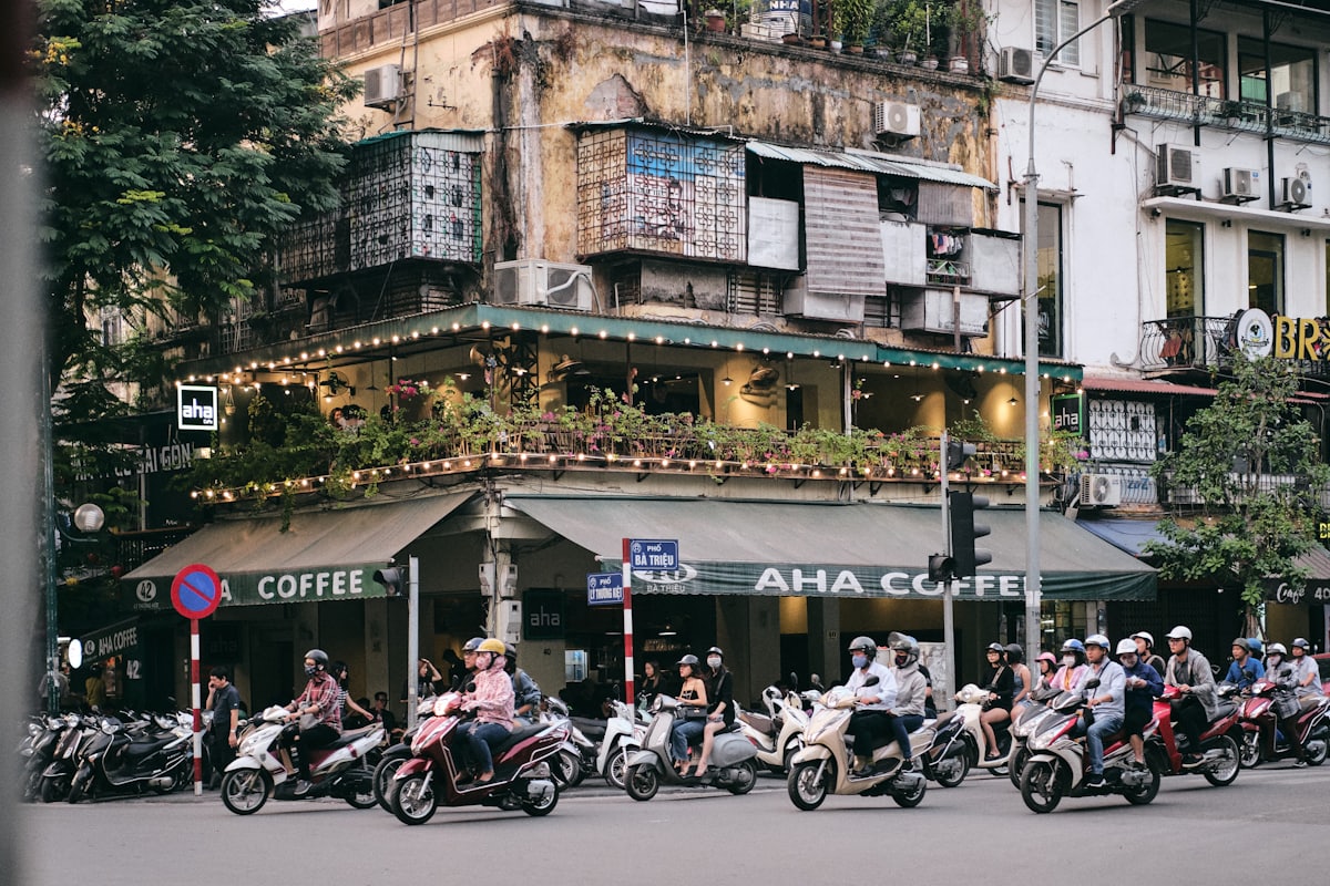 Motorbikes riding down a Hanoi street